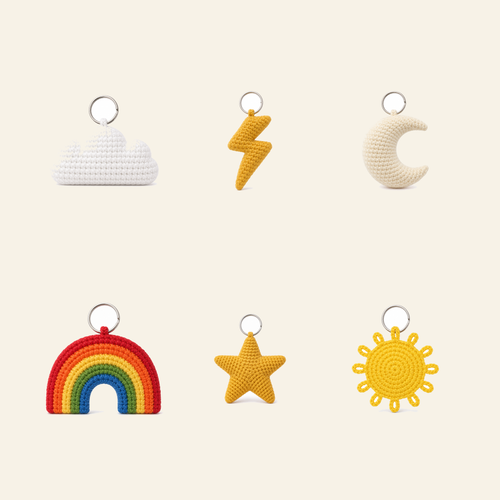 All 6 sky and star crochet bag charms in the set, shown together